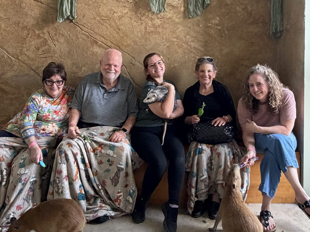 Guests enjoying the Capybara and Friends experience at Capybara Cafe Fort Lauderdale